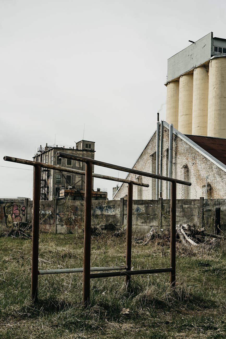 rusty metal rack in an abandoned backyard