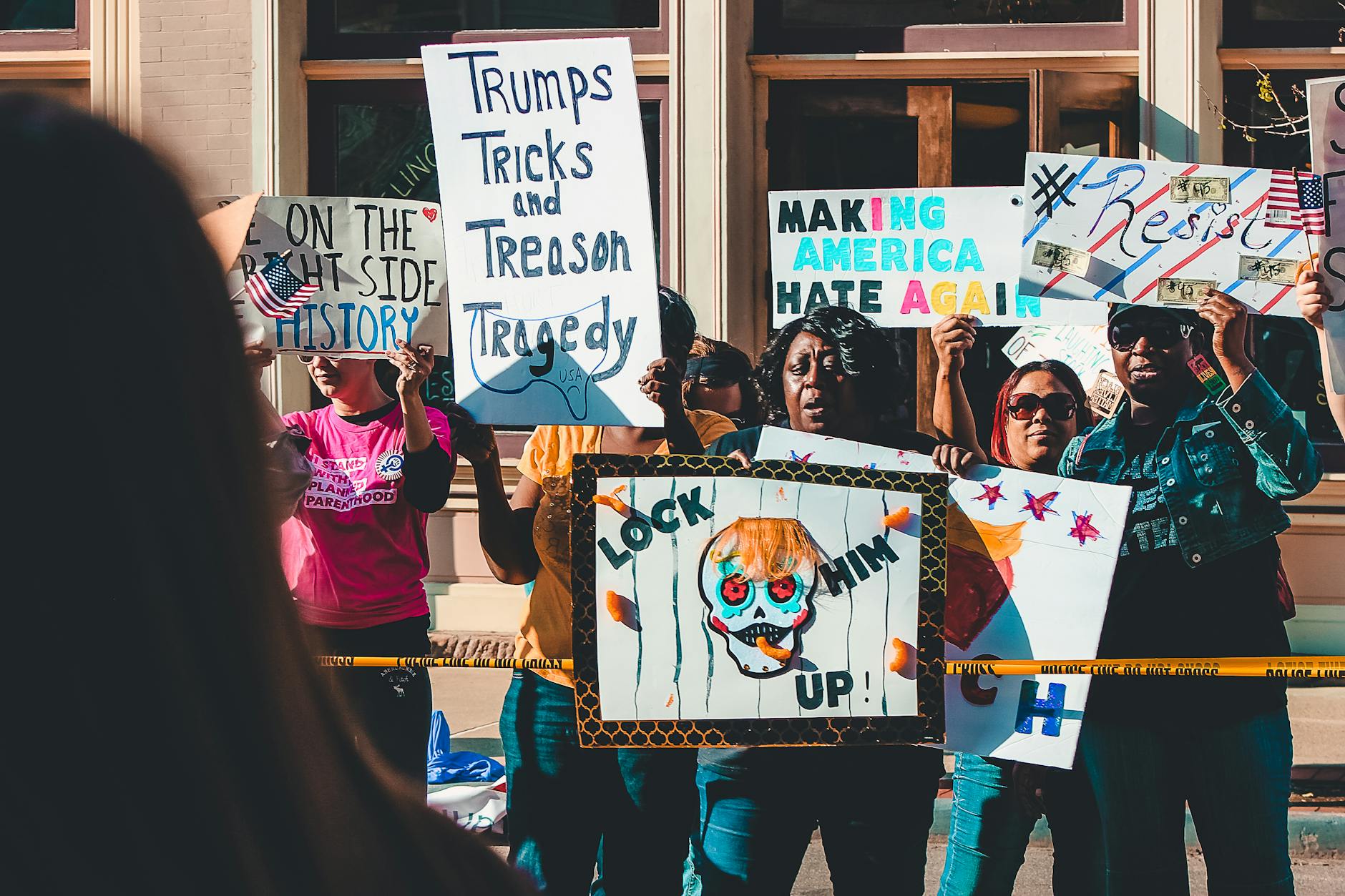 group of people rallying near building