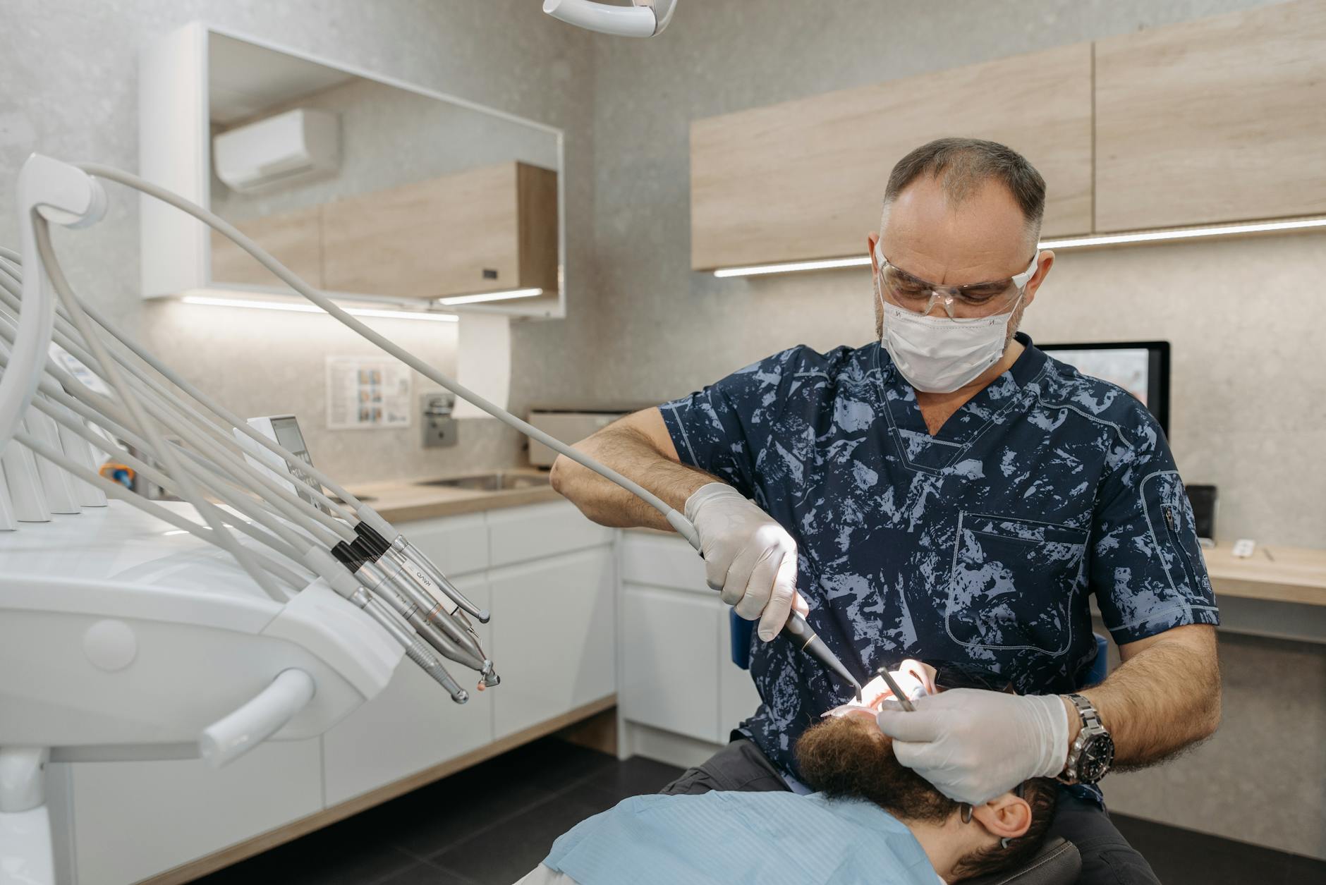 dentist checking on a patient s teeth